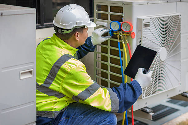 Professional Heat Pump Repair technician working in Monticello, MN
